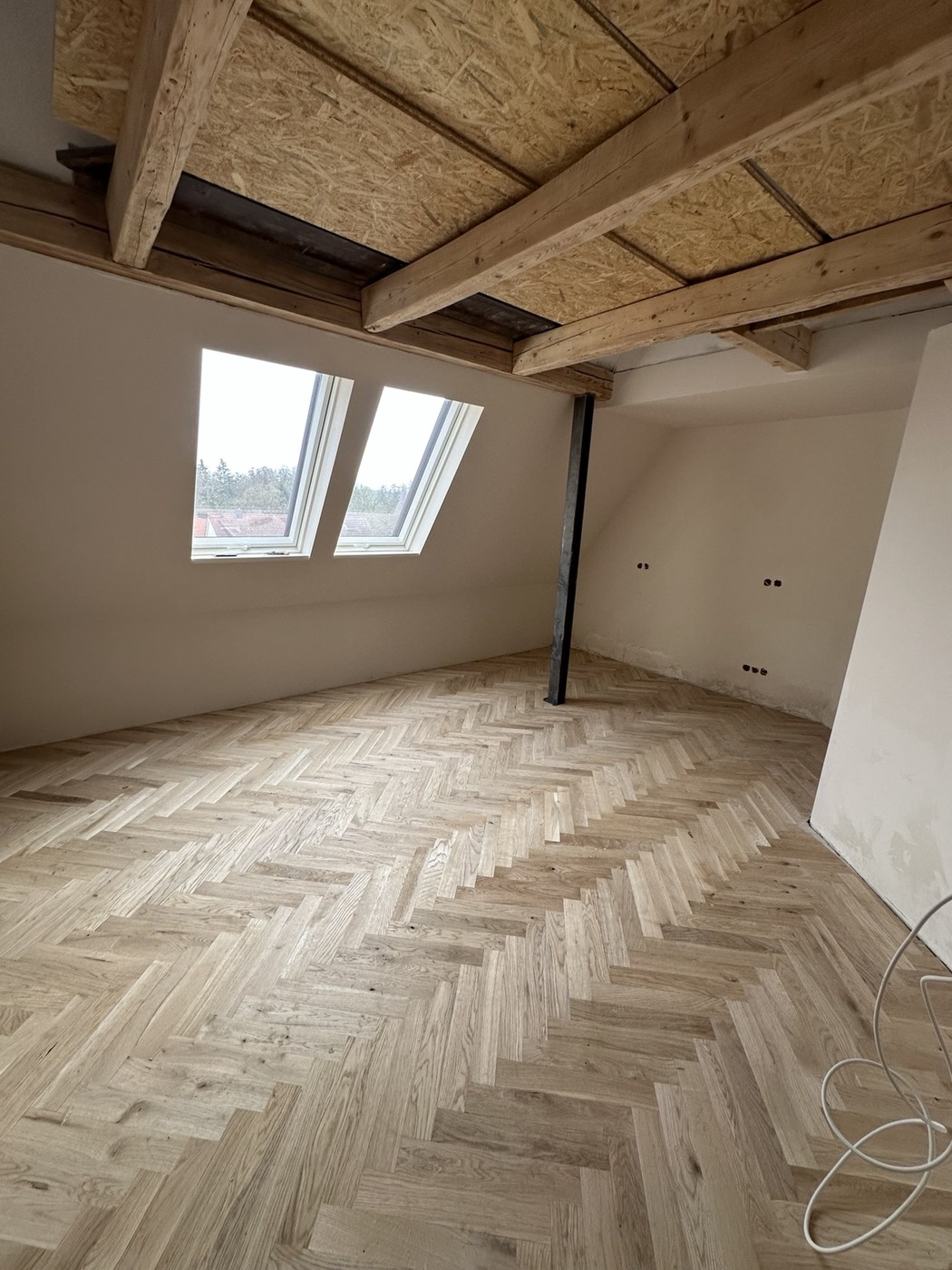 Innenausbau mit Fischgrätparkett